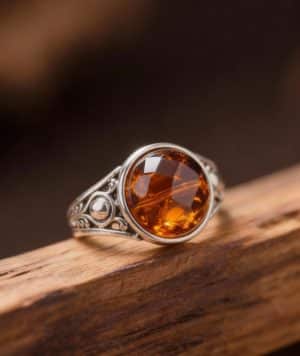 freepik__crea-un-anillo-de-ambar-y-plata-con-estilo-barroco__35315